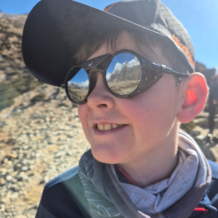 William wearing his Vallon Heron Glacier glasses. You can see the mountains in the mirrors 