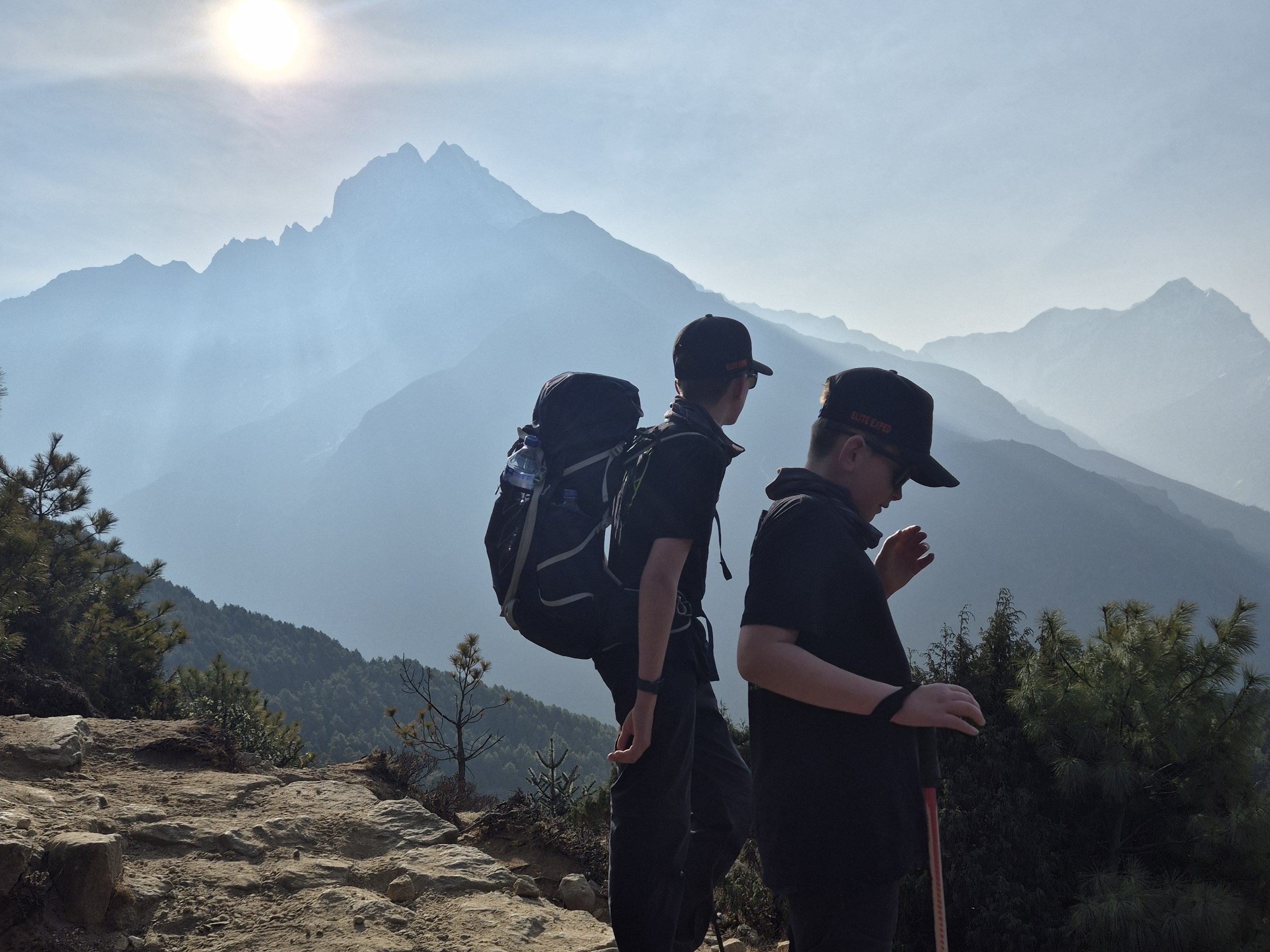 Ben and Will with the mountains behind
