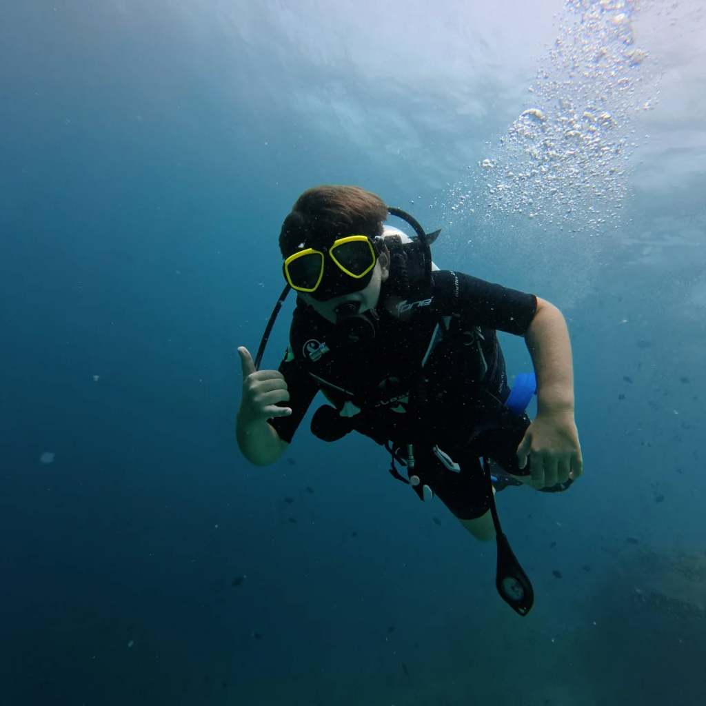 William Scuba diving in the Maldives